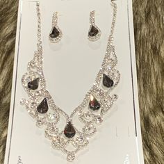 Very Lightweight Make Us An Offer, We Ship Within 24hrs Silver Metal Jewelry Sets With Bling, Silver Bling Jewelry Sets For Gift, Silver Costume Jewelry Sets With Bling, Black Teardrop Jewelry With Rhinestones, Silver Teardrop Jewelry For Party, Black Teardrop Rhinestone Jewelry, Silver Bling Costume Jewelry Sets, Silver Bling Jewelry Sets For Formal Occasions, Evening Jewelry Sets In Silver With Bling