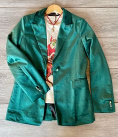 Party up top! Trendy & Chic Green Velvet Blazer Stylish loose fit blazer for any occasion you have this Holiday Season Flap Pockets Fully Lined Single button closure & three buttons on cuff Button Detail Pictures coming soon Green Single Breasted Button-up Blazer, Green Single Breasted Blazer, Party Blazer With Lapel Collar And Buttons, Party Blazer With Double Button Closure, Trendy Green Button-up Blazer, Single Breasted Button-up Party Blazer, Single Breasted Button-up Blazer For Party, Green Button-up Formal Blazer, Green Button-up Blazer For Formal Occasions