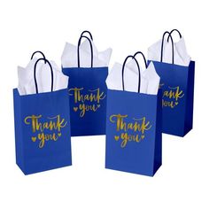 four blue bags with thank you written on the front and bottom, one in gold foil