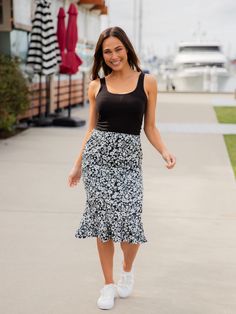 Hey there fashion lovers! Are you ready to add some fresh prints to your wardrobe? Our new Patterned Ruffle Hem Pencil Skirt is just what you need! This beautiful skirt will give your outfit a pop of color and flowy movement that will make you feel like a fashion icon. Pair it with a basic tee, jean jacket, and booties for a stylish and effortless look that will turn heads. Whether you're going out with friends or running errands, the Patterned Ruffle Hem Pencil Skirt is perfect for any occasion Trendy Lined Pencil Skirt For Day Out, Chic Printed Skirt For Day Out, Trendy Spring Lined Pencil Skirt, Trendy Lined Pencil Skirt For Spring, Spring Printed Pencil Skirt, Black Pencil Skirt For Spring Day Out, Summer Ruffled Pencil Skirt, Chic Printed Mini Skirt, Black Trendy Summer Pencil Skirt