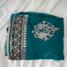 Beautiful Heavy Green Saree With Silver Embroidery Silver Traditional Wear With Intricate Embroidery For Eid, Silver Traditional Wear With Intricate Embroidery For Festive Season, Festive Silver Traditional Wear With Intricate Embroidery, Silver Resham Embroidery Saree For Festive Occasions, Festive Silver Saree With Resham Embroidery, Silver Saree With Resham Embroidery For Eid, Silver Embellished Traditional Wear, Eid Embellished Silver Lehenga, Embellished Silver Lehenga For Eid