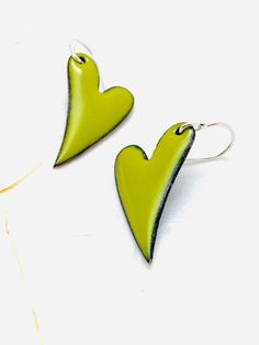 Heart Earrings ~ Chartreuse green Enamel Minimalist Asymmetrical Heart Drop Earrings A perfect gift for the one you love! And if that's you, that's great!! Copper heart with fused enamel. Made with Sterling silver earwires. Handle as glass. Handmade in The Pacific Northwest Green Heart-shaped Earrings For Gifts, Green Heart Drop Earrings For Gifts, Green Nickel-free Heart Earrings As Gift, Handmade Green Earrings For Valentine's Day, Nickel Free Green Heart Earrings, Nickel-free Green Heart Earrings, Green Pierced Heart Earrings As Gift, Pierced Green Heart Earrings As Gift, Green Heart-shaped Earrings For Valentine's Day