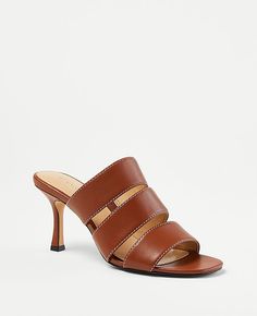 Step into elegance with the Ann Taylor Three Strap Leather Sandals, a perfect blend of style and comfort designed for the modern woman. These sandals feature:

- Size: 9 1/2
- Color: Midnight Mahogany
- Material: 100% Leather
- Gender: Female
- Open toe design
- Padded footbed for enhanced comfort
- Heel Height: 3 inches

Crafted from luxurious leather, these sandals boast a triple strap configuration that adds a sophisticated touch to any outfit. Whether you're attending a formal event or enjoy Comfort Design, Comfortable Heels, Toe Designs, Strap Sandals, Modern Woman, Leather Sandals, Effortless Style, Ann Taylor, Gender Female