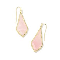 You'll want to add the Jessie Drop Earrings to your cart ASAP. Combining timeless design with contemporary materials, these teardrop earrings will frame any face shape, creating the ultimate wear-anywhere accessory. To preserve your fashion jewelry for years to come, agents such as soaps, perfumes, lotions, makeup, hair and cleaning products, and other chemical contact should be avoided. Take care to remove jewelry before showering, sleeping, exercising or swimming. Kendra Scott is known for its Modern Pink Teardrop Jewelry, Contemporary Materials, Rose Quartz Color, Silhouette Frames, Small Drop Earrings, Ivory Earrings, French Wire, Kendra Scott Jewelry, Accessories Jewelry Earrings