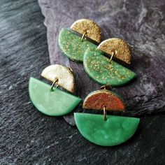 I make these fantastic green and gold clay stud earrings of lightweight Polymer clay, precious 24k gold-leaf and 22ct gold plated brass stud earrings with butterfly clasps. I have chosen the green and gold colour combination to create a modern and stylish Statement piece that is perfect for any occasion. The smaller top half circle is gilded, not only because it gives every earring a high-quality appearance, but it works as a mirror for the sun while you are wearing it.  During the baking proces Elegant Green Resin Earrings, Green Gold Plated Round Earrings, Green Gold-plated Round Earrings, Green Round Gold-plated Earrings, Green Earrings For Jewelry Making, Green Drop Earrings With Unique Variations, Pierced Green Gold-plated Earrings, Green Gold-plated Pierced Earrings, Green Gold-plated Earrings