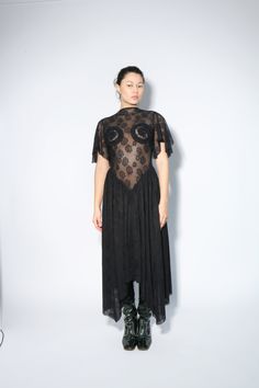 NOTE: This is a PRE-ORDER purchase. This piece is expected to ship Mid/late December 2024. This long lace dress exudes prima donna excellence with its princess waist cut, intricate detailing on the chest, and graceful boat neck. The addition of frivolous lace sleeves adds a touch of romantic charm, making it an unexpected choice for formal occasions. Fitted A-line Lace Dress, Lace A-line Midi Dress With Fitted Bodice, Lace Midi Dress With Fitted Bodice For Gala, Fitted Lace Bodice Midi Dress, Fitted Lace Dress With Lace Patchwork For Evening, Fitted Lace A-line Midi Dress, Fitted A-line Lace Midi Dress, Fitted Lace Gala Dress, Evening Dress With Contrast Lace