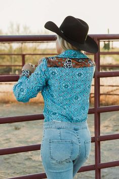 Turquoise is widely considered to be a cowgirl's favorite color. We bumped your boring turquoise button down up a notch with this Thunderbird Brand exclusive. A shimmery turquoise and silver holographic bandana print spandex makes up the body of the shirt with a pretty custom printed satin contrast. You'll shine in the arena whenever you wear this shirt! NOTE - Please review the size chart to determine your appropriate size. Some customers find they wear a different size than normal in this bran Brunette Models, Cowgirl Style Outfits, College Fits, Blonde Model, Bandana Print, Cowgirl Style, The Ranch, Favorite Color, Custom Print