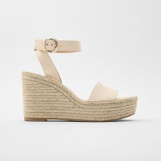 Zara Ecru Jute Leather Espadrille Wedges Zara Bloggers Fave Leather Ecru Wedge Sandal, Leather Upper, Wraparound Ankle Strap Closure, Jute Lined Wedge, Heel Height 3.7 Inches Us10/Eur41 Tag: Zara Bloggers Favorite, Zara Ecru, Zara Sandals, Zara Wedge, Zara Espadrilles, Summer Sandals, Wedge Sandals, Espadrilles Wedge, Leather Sandals, Leather Wedge Sandals, Nude Sandals, Off White Sandals Chic Open Toe Cream Espadrilles, Chic Cream Open Toe Espadrilles, Cream Leather Open Toe Espadrilles, Chic Cream Espadrilles With Ankle Strap, Cream Leather Espadrilles For Beach, Cream Leather Espadrilles For The Beach, Cream High Heel Espadrilles For Spring, Chic Beige Wedge Heel Espadrilles, Chic Beige High Heel Espadrilles