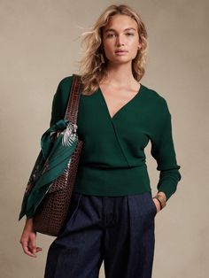 Subtle drama, this beautiful wrap-front sweater employs a blouson sleeve and ribbed texture along the cuff and hems to create gentle contrast to the more fitted bodice.  Crafted from a soft and smooth blend of LENZING™ ECOVERO™.  SEMI-FITTED: Cut Spring Office Wear, Forest Emerald Green, Wrap Front Sweater, Black Turtle Neck, Classy Winter Outfits, Olive Green Sweater, Cable Knit Turtleneck Sweater, Blouson Sleeve, Winter Capsule Wardrobe