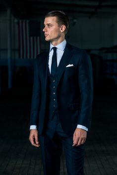 Color: Navy Dapper Wool Suits For Workwear, Dapper Tailored Suits For Workwear, Tailored Dapper Suits For Work, Dapper Tailored Blazer For Workwear, Tailored Tweed Jacket For Business, Fitted Wool Three-piece Suit For Office, Tailored Double Breasted Suit For Work, Tailored Dapper Double Breasted Suit For Workwear, Tailored Timeless Suit And Tie Accessories