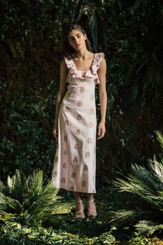 Made from fabulous embroidered linen, this is the ultimate head turning summer dress. Featuring a bold floral embroidery with golden accents, a ruffled neckline, and tie-back straps for an adjustable fit, this will be your go to summer cocktail dress. Composition: -100% Linen -Silk Embroidery -Dry Clean Only Sizing: Given the organic nature of this cut, the straps in the back allow for a more adjustable fit around the bust. Please see size chart below for your best fit. **XS/S fits European 34/3 Gul Hurgel, Summer Cocktail Dress, Adriana Degreas, Organic Nature, Rebecca Vallance, Jenny Bird, Olympia Le Tan, Summer Cocktail, Ruffled Neckline