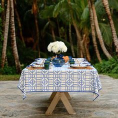 Graphic, yet sophisticated, our Blue Bamboo Tablecloth features a geometric bamboo pattern that adds a modern, fresh touch to a Spring table setting. Crisp blue and white is always a fan favorite, everywhere and every time of the year. Available in four sizes. This signature Pomegranate just so happens to match the 2022 color of the year! Denim Table Runner, Winter Tablescapes, Rattan Charger, Spring Table Settings, Blue Bamboo, Red Tablecloth, Blue Table Runner, Bamboo Pattern, Blue Tablecloth