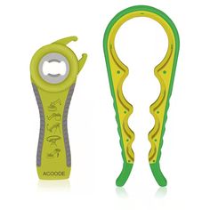 a green and yellow plastic bottle opener next to a pair of scissors on a white background