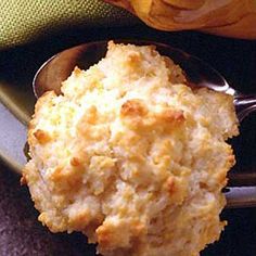 a close up of a spoon with food on it