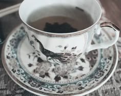 a cup of tea sitting on top of a saucer