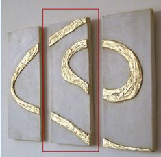 three pieces of art hanging on the wall with gold foiled letters and swirls