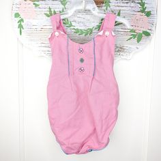 The romper's enchanting vintage pink hue evokes a sense of innocence and sweetness. The front of the romper features embroidered butterflies, adding a whimsical touch that is sure to capture hearts. Designed for babies aged 3 months, this romper offers an ideal fit and allows for freedom of movement, ensuring your little one can explore the world in comfort. The snap closures at the bottom make diaper changes a breeze. Pink Cotton Bubble Romper For Spring, Spring Pink Cotton Bubble Romper, Pink Bubble Romper For Spring Playwear, Pink Bubble Romper For Playwear In Spring, Pink Fitted Bubble Romper For Playtime, Fitted Pink Bubble Romper For Playtime, Pink Fitted Bubble Romper For Spring, Fitted Pink Bubble Romper For Spring, Spring Fitted Pink Bubble Romper