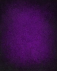 a dark purple background with some black spots