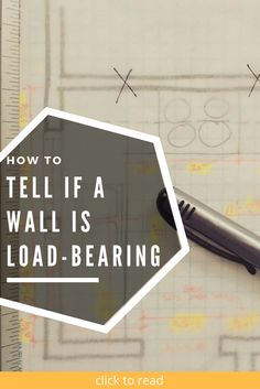 a pen sitting on top of a piece of paper with the words how to tell if a wall is load bearing