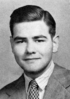 an old black and white photo of a man in a suit