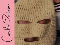 a crocheted mask with holes in it and the words overlay written below