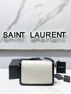 YSL Saint Laurent MONOGRAM Cross-body shoulder strap Adjustable length One main compartment contains card slots, a foldable flat pocket and a front foldable document pocket.

 Size 23x16x6 High-end White Flap Bag For Travel, High-end White Flap Bag For Daily Use, Formal White Shoulder Bag With Logo, High-end White Crossbody Flap Bag, Designer Rectangular Satchel With Logo, White Logo Shoulder Bag For Formal Occasions, White Flap Bag For Travel With Dust Bag, Designer White Crossbody Box Bag, High-end Rectangular Shoulder Bag With Logo