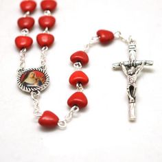 Crafted with lovely red stones, featuring Saint Rita, this rosary is beautifully vibrant. Gift Rosary Bracelet With 8mm Beads And Crucifix, Mother's Day Gift Rosary With 8mm Beads, Red Crucifix Rosary As Gift, Gift Rosary With 8mm Beads And Cross Shape, Personalized Spiritual Rosary As Gift, Red Spiritual Rosary As Gift, Spiritual Crucifix Rosary As Gift, Spiritual Rosary As Valentine's Day Gift, Spiritual Red Crucifix Rosary