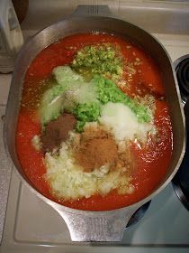 a pan filled with food on top of a stove