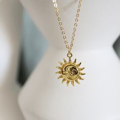 "Beautiful and lovely gold moon and sun face pendant necklace. Made of the gold plated sun and moon face pendant with a skinny gold plated brass chain. Soft and simple. Great for a gift, every day, or on a special occasion. Your item will ship in a gift box. Please feel free to contact me if you have any questions. ♥ Length 15\" - 20\" chain ♥ Pendant 5/8\" ♥ Gold plated over brass ♥ See more Rudiana Accessories Rudiana.etsy.com" Moon And Sun Face, Sun And Moon Face, Necklace Sun, Face Pendant, Necklace Moon, Sun Face, Sun Necklace, Moon Face, Gold Moon