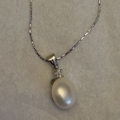 Never Worn Silver Pearl Necklace With A Single Diamond. In Good Condition. Silver Pearl Necklace, Pearl Pendant Necklace, Silver Pearls, Pearl Pendant, Womens Jewelry Necklace, Pearl Necklace, Jewelry Necklaces, Women Jewelry, Pendant Necklace