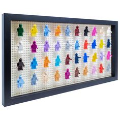 legos are arranged in the shape of people on a white background with black frame