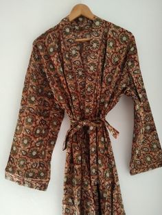 Cotton robe Long Bohemian Kimono For Loungewear, Bohemian Floral Print Robe For Loungewear, Bohemian Long Sleeve Kimono For Loungewear, Bohemian Wrap Robe For Home, Vintage Long Kimono For Vacation, Bohemian Long Sleeve Brown Kimono, Bohemian Brown Long Sleeve Kimono, Brown Long Sleeve Kimono For Vacation, Cotton Robe For Beachwear And Loungewear