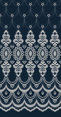 an intricate lace pattern on a dark blue background