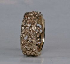 Flower Band in 14k Gold Size 4.5 Unique 14k Gold Hallmarked Rings, Engraved 14k White Gold Jewelry, Handmade 14k Gold Jewelry For Weddings, Unique Engraved Jewelry For Wedding, Unique Engraved Wedding Jewelry, Unique Yellow Gold Collectible Jewelry, 14k Gold Wedding Jewelry With Intricate Design, Wedding Jewelry With Intricate Design In 14k Gold, 14k Gold Jewelry With Intricate Design For Wedding