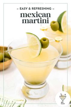 two glasses filled with drinks and limes on the rim are garnished with an olive