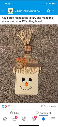 a paper bag with a scarecrow face on it and the words dollar tree crafts n