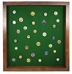 a wooden frame with many different types of buttons on the front and back of it