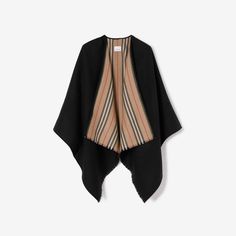 Icon Stripe Wool Reversible Cape in Black | Burberry® Official Burberry Cape Outfits, Burberry Cape, Cape Outfit, Burberry Monogram, Thomas Burberry, Cape Designs, Black Cape, Designer Coats, Wool Cape