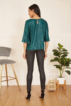 Perfect matched with skinny leather trousers, this all-over sequin detail Green top comes in a relaxed, flattering fit, with statement fluted sleeves and a peep hole back fastening. Plus Size Christmas Tops, Fluted Sleeves, Dressing Gown Robe, Tall Dresses, Green Sequins, Puff Sleeve Dresses, Cold Weather Outfits, Leather Trousers, Green Top