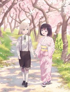 two people are walking down a path in the woods with cherry blossoms on trees behind them