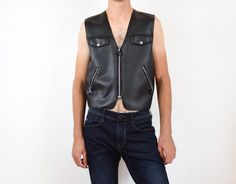 Vintage 90s black vest In good vintage condition. Normal signs of wear Size: medium Material: faux leather M E A S U R E M E N T S - taken seam to seam lying flat - not doubled bust 51 cm = 20 in length 52 cm = 20,5 in Thank you for your visit! View more products: https://www.etsy.com/shop/VintageSeventhHeaven Feel free to contact me if you have any questions. Cotton Corset, Faux Leather Vest, White Corset, Mens Vests, Black Vest, Leather Vest, Mens Vest, Rock Style, Slovenia