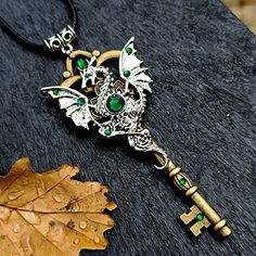 Steampunk dragon necklace. Beautiful pendant green rhinestones. Great gift for you or someone. This pendant is in stock. It will be delivered to you in the USA or Europe in +-7 days! 💌 Made with love and ready to ship. Please avoid contact with water. Gothic Metal Jewelry With Dragon Design, Metal Dragon Design Jewelry Gift, Metal Jewelry With Dragon Design As Gift, Metal Jewelry With Dragon Design For Gift, Punk Style Nickel-free Necklace For Gifting, Handmade Punk Necklaces For Cosplay, Punk Pendant Necklace For Gift, Punk Style Pendant Necklace For Gift, Punk Metal Jewelry For Fantasy Events