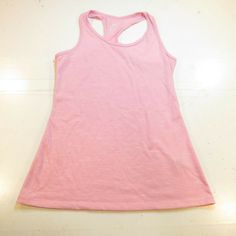 NIKE DIR FIT ATHLETIC SLEEVELESS TANK TOP T SHIRT Womens XS Pink Size Womens XS    GREAT CONDITION: Snag in shirt as shown.   100% AUTHENTIC QUALITY MADE The shirt measures from armpit to armpit 16"    and measures from top to bottom 25" The color is: Pink The fabric content is: 95% Polyester 5% Rayon   GL5 The letters above are for us to locate the item in our collection    There are more large photos of this item at the bottom of the page                 About TheBestStuffEver Our goal is 100% Nike Stretch Tops For Light Sports, Casual Racerback T-shirt For Sports, Sporty Racerback T-shirt For Sports, Pink Crew Neck Tank Top For Sports, Casual Racerback Tops For Light Sports, Fitted Casual Tank Top For Light Sports, Casual Fitted Tank Top For Light Sports, Nike Pink Tops For Sports Season, Nike Casual Tops For Light Exercise