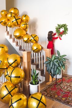 a bunch of balloons that are on the stairs