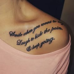 a woman with a tattoo on her chest that says, inside when you want to stay