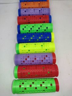 several plastic toys are lined up in a row