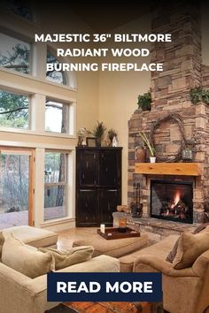 a living room filled with furniture and a fire place in front of a stone fireplace