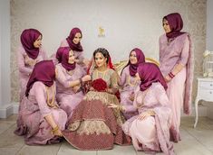 a group of women sitting next to each other