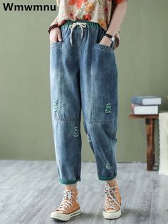 SPECIFICATIONS Streetwear Ripped Hole Harem Jeans Women's Korean Baggy Ankle-length Denim Pants Design Casual Vaqueros Loose Lace Up Pantalones Brand Name: WMWMNU Material: COTTON Material: POLYESTER Elasticity: Medium Strecth Fabric Type: Softener Length: Ankle-Length Pants Fit Type: LOOSE Style: Casual Decoration: Pockets Decoration: HOLE Decoration: Ripped Decoration: Lace Up Origin: Mainland China CN: Hunan Jeans Style: Harem Pants Age: 25-34 Waist Type: high Model Number: DR331 ripped hole Denim Pants Design, Harem Jeans, Vintage Wash Jeans, Jeans Streetwear, Pants Fit, Loose Style, Pants Design, Ankle Length Pants, Streetwear Women