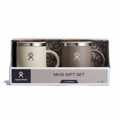 two coffee mugs in a gift box